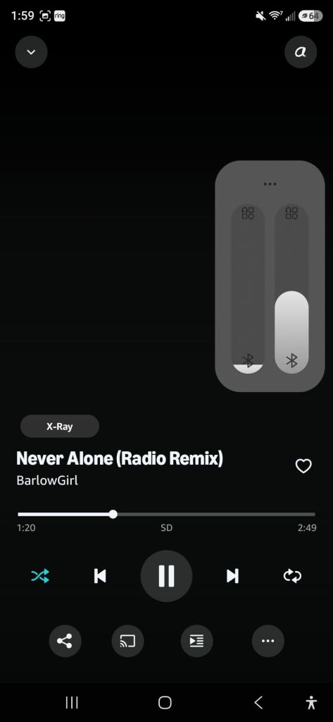 Music player interface showing a song titled 'Never Alone (Radio Remix)' by BarlowGirl, with playback controls and Bluetooth connection options.